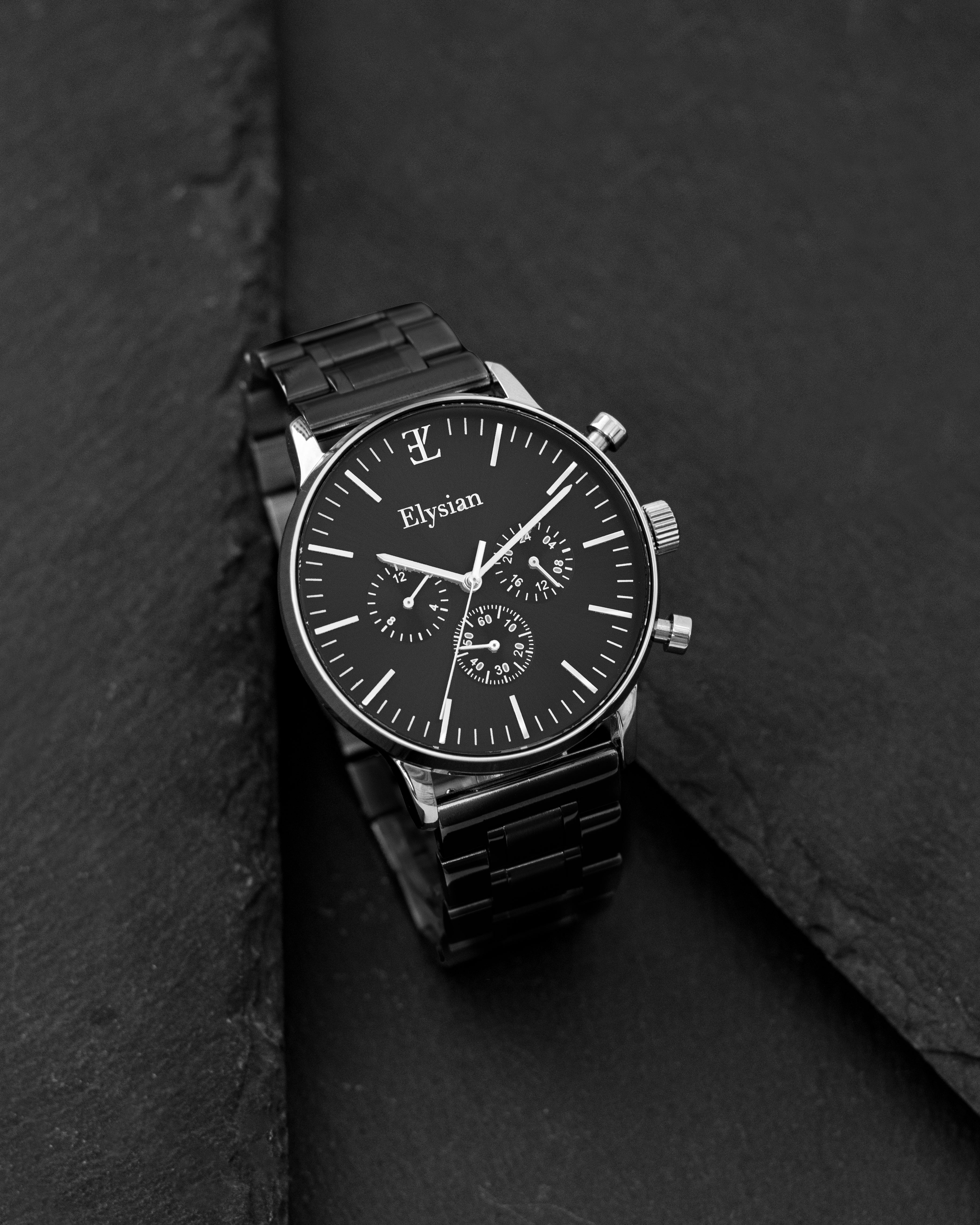 elysian-zilveren-heren-horloge-zwart-plaat-zwart-schakelband-horlogeband-ELYWM01140-second