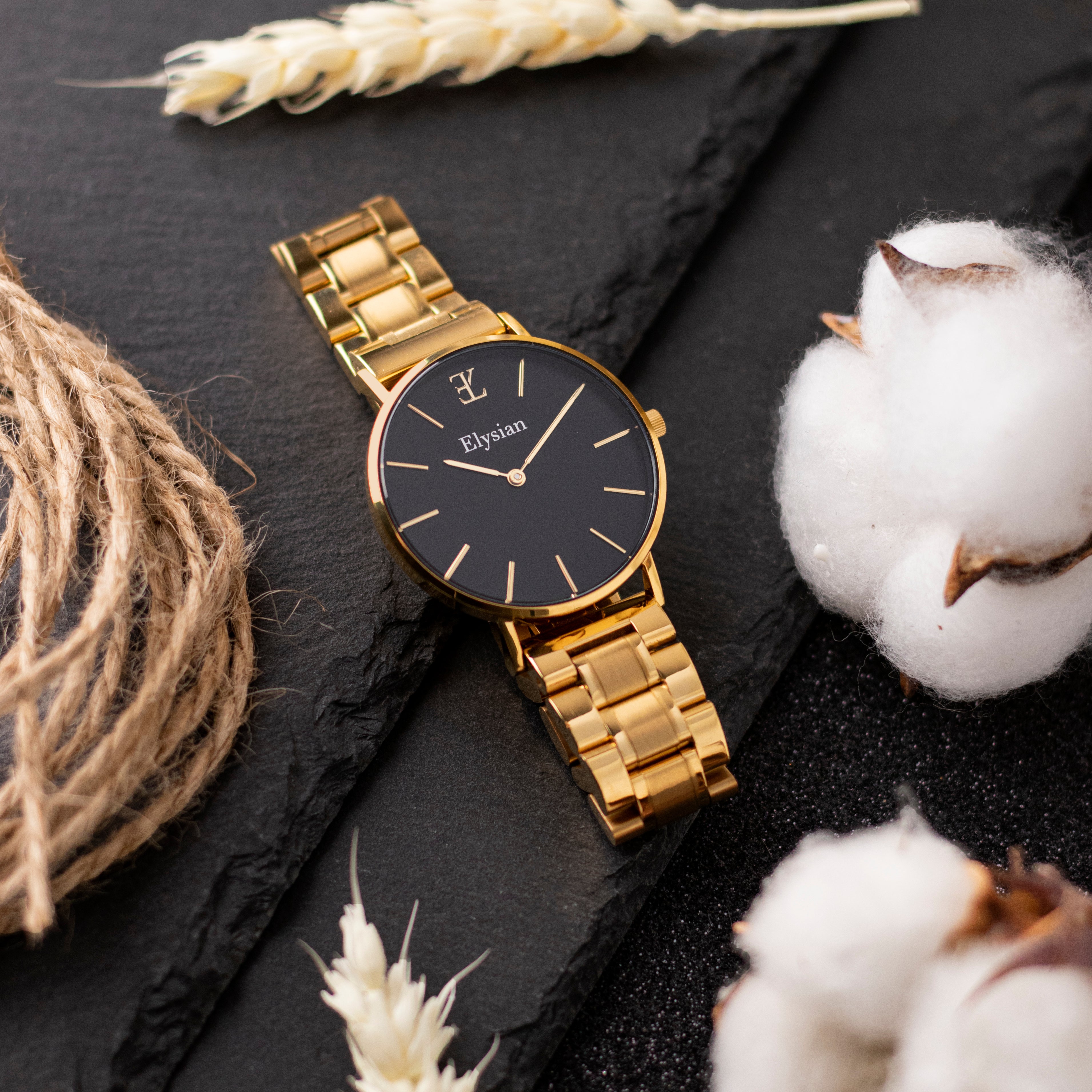 elysian-gouden-dames-horloge-zwart-plaat-goud-schakelband-horlogeband-ELYWW00126-second