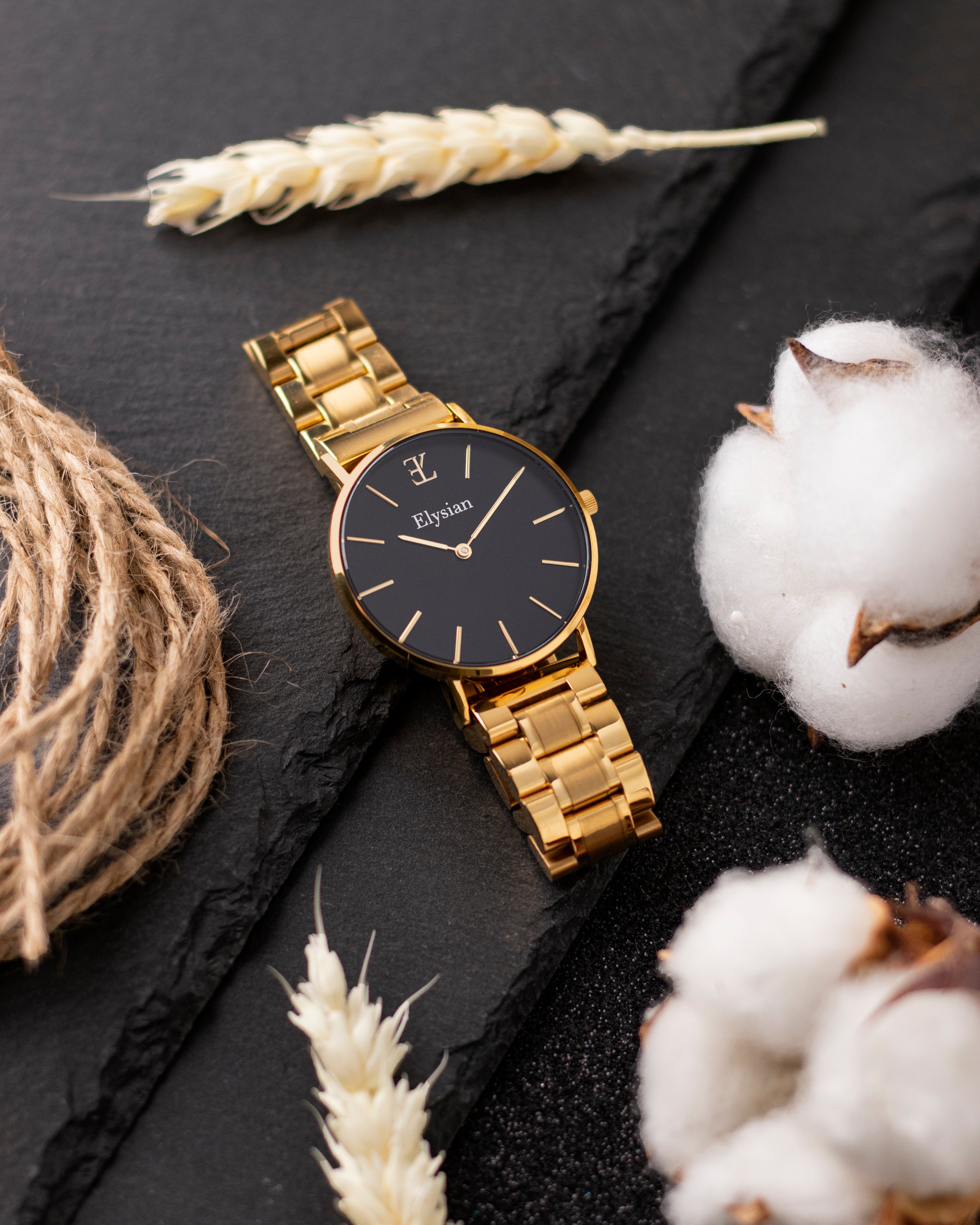 elysian-gouden-dames-horloge-zwart-plaat-goud-schakelband-horlogeband-ELYWW00126-second