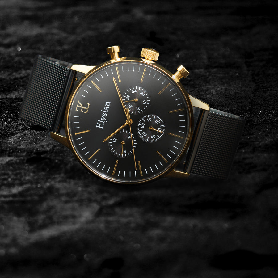 elysian-gouden-heren-horloge-zwart-plaat-zwart-mesh-horlogeband-ELYWM00130-second