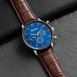 elysian-zilveren-heren-horloge-blauw-plaat-bruin-croco-horlogeband-second