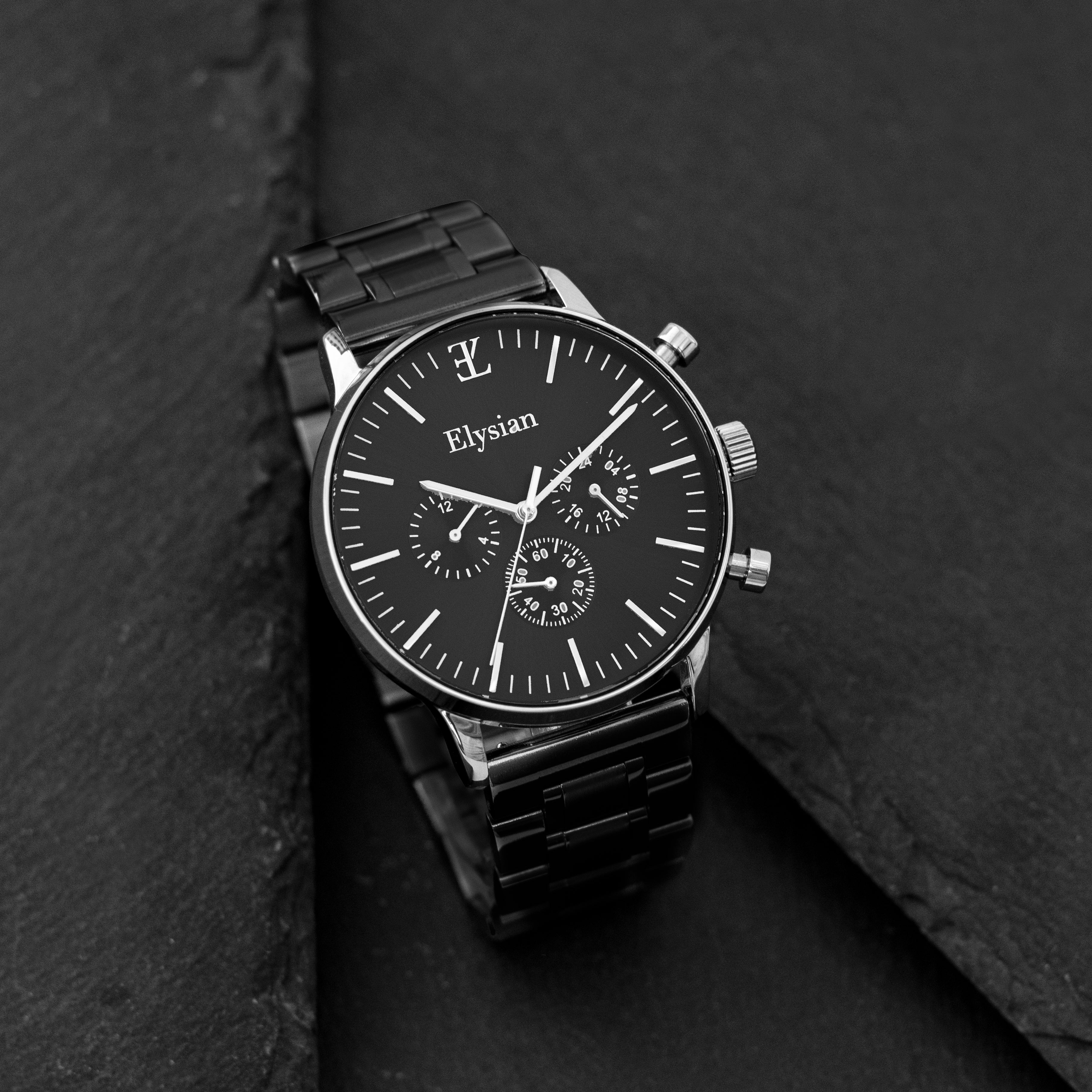 elysian-zilveren-heren-horloge-zwart-plaat-zwart-schakelband-horlogeband-ELYWM01140-second